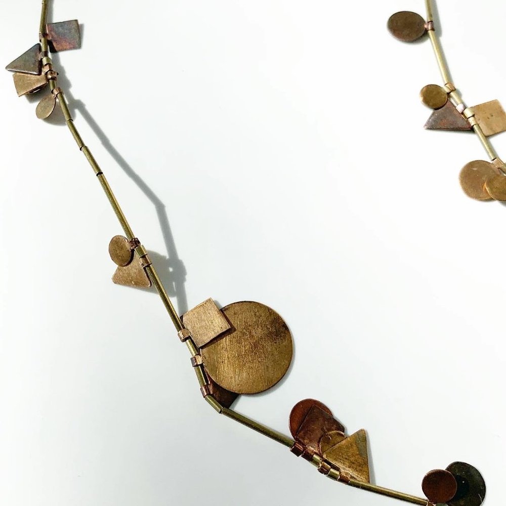 SAMMA "manyshapes" necklace in brass and bronze